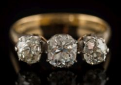 A diamond three-stone ring: with graduated, old-cut diamonds approximately 0.40ct, 0.70ct and 0.