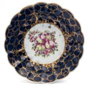 A First Period Worcester porcelain bowl: of scalloped and fluted form,