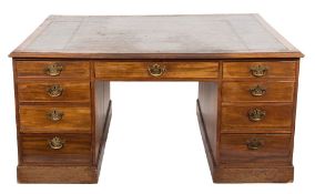 A George III partners mahogany kneehole desk:, the rectangular top with a moulded edge,