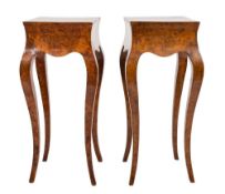 A pair of burr yew wood veneer square pedestal stands:, having shaped apron sides,