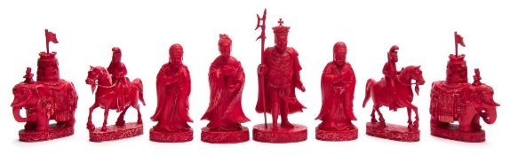 A 19th century Chinese Export carved and stained ivory export chess set: one side stained red with