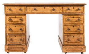A 19th Century walnut, burr maple, oak and inlaid pedestal desk:,