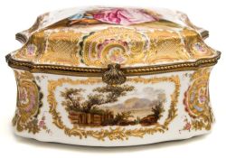 A German porcelain casket: of cartouche shape with gilt metal mounts,