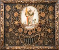 An early 19th century Italian quillwork reliquary picture of Saint Donatianus: the central oval