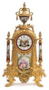A French Victorian gilt-metal and porcelain mantel clock: the eight-day duration movement striking