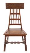 An Arts and Crafts teak occasional chair:,