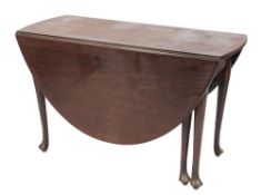 A mid 18th Century mahogany oval drop flap dining table:, with a hinged top on tapered legs,