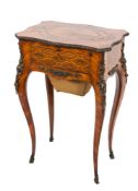 A 19th Century French kingwood, parquetry and gilt metal mounted work table:,