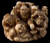A Japanese carved ivory netsuke,