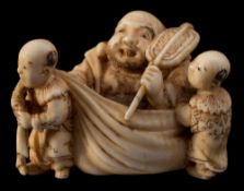 A Japanese carved ivory netsuke,
