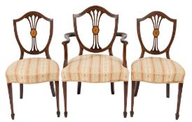 An Edwardian mahogany and inlaid seven piece drawing room suite: in the Sheraton taste,