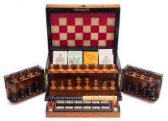 A Victorian rosewood games compendium: of rectangular outline bordered with ebony,