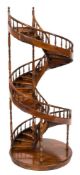 An apprenticeman's stained walnut circular spiral staircase:,