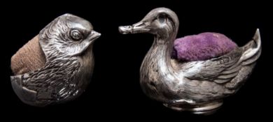 An Edward VII silver pin cushion, maker Sampson Mordan & Co Chester 1908:,