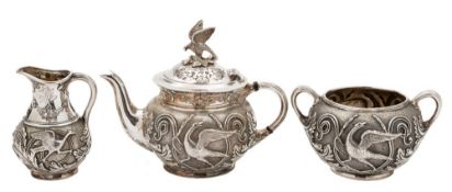 A Victorian silver three-piece bachelor's tea service, maker Walker & Hall, Sheffield,