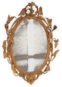 A 19th Century later gilt decorated oval mirror:,