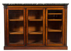 By Holland and Sons A Victorian mahogany and ebonised cockbeaded low bookcase:,