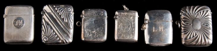 A Victorian silver vesta case, maker WH, London, 1895: initialled, with engine turned decoration,