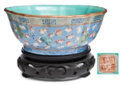 A Chinese famille rose porcelain bowl: of fluted form,