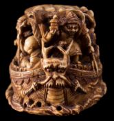 A Japanese carved ivory netsuke, signed Meigyoku: in the form of a Takarabune,