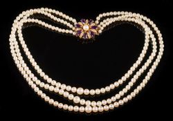 A cultured pearl three-strand necklace: the cultured pearls graduated from 4mm diameter to 7mm