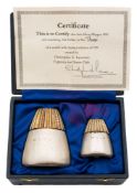 An Elizabeth II silver and silver-gilt and silver pepper mill and matching salt: maker Christopher
