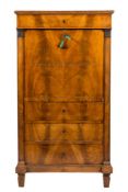 A 19th Century French birch secretaire a abbatant:, with a moulded cornice and fireze drawer,