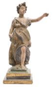An Italian carved wood and polychrome decorated standing female figure: wearing traditional robes