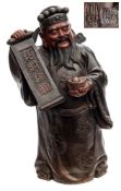 A Chinese Yixing figure of Lu: modelled standing in Mandarin's robes decorated with dragon