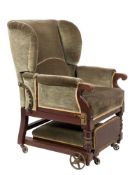 An Invalid's 19th Century mahogany wing armchair:, with adjustable upholstered back,