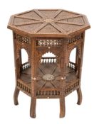 A late 19th Century Indian carved wood and inlaid octagonal centre table:,