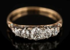 A graduated diamond five-stone ring: with circular old-cut diamonds estimated to weigh a total of 0.