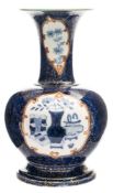 A late 19th century English porcelain vase: of baluster form with flared neck,