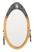 A giltwood and blue decorated oval mirror:,