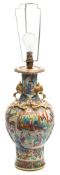 A Canton famille rose baluster vase: with crane handles and applied chilong to the shoulders,
