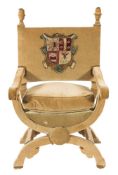 An Italianate curved X-frame armchair:, in the 17th Century taste,