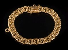 A double curb-link bracelet: the clasp stamped '18K', 42gms gross weight.