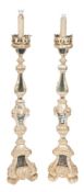 A pair of Italian carved and silvered wood and mirrored panel standard lamps:,