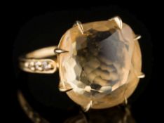 A citrine mounted single-stone dress ring: the circular citrine 15.