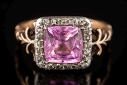 An antique-style diamond and pink gem-set cluster ring: with a central square synthetic pink
