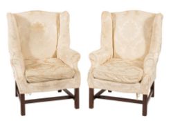 A pair of mahogany wing frame armchairs in the Georgian taste:,