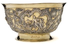 A Continental silver-gilt bowl: decorated in the rococo taste with female figures, dolphins,