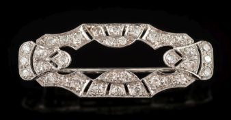 An Art Deco diamond mounted brooch: of rounded rectangular design,