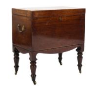 An early 19th Century mahogany and inlaid cellarette:,