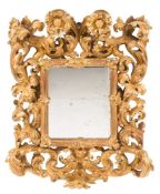 A 19th Century Continental carved giltwood mirror:, of rectangular shape,