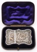An Indian silver filigree card case: of cartouche-shaped outline,