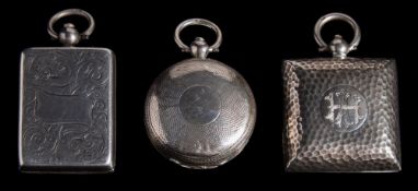 A George V beaten silver sovereign case, maker E J Houlston, Birmingham, 1911: initialled, 3.25cm.