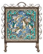 A Persian Qajar polychrome moulded pottery tile panel: depicting a hunting scene with a small