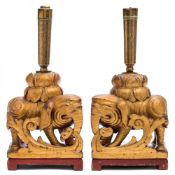 A pair of 19th century Chinese incense burners: the brass burners of cylindrical form with dragon