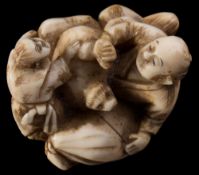 A Japanese carved ivory netsuke,